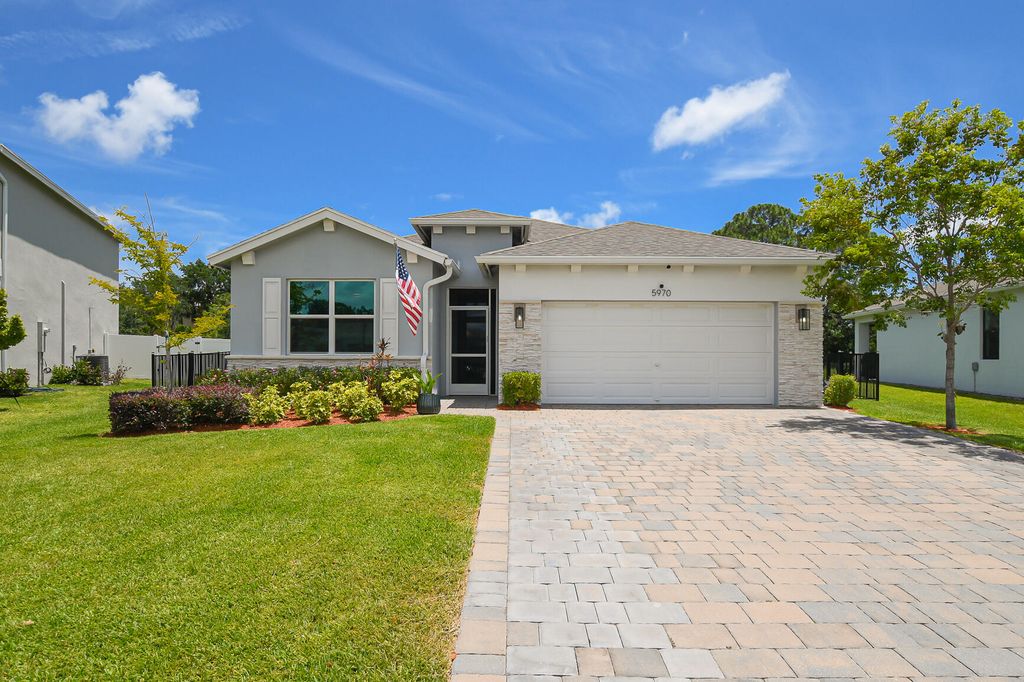 Photo of 5970 SE Skyblue Circle, Stuart, FL 34997 (MLS # B26032341)