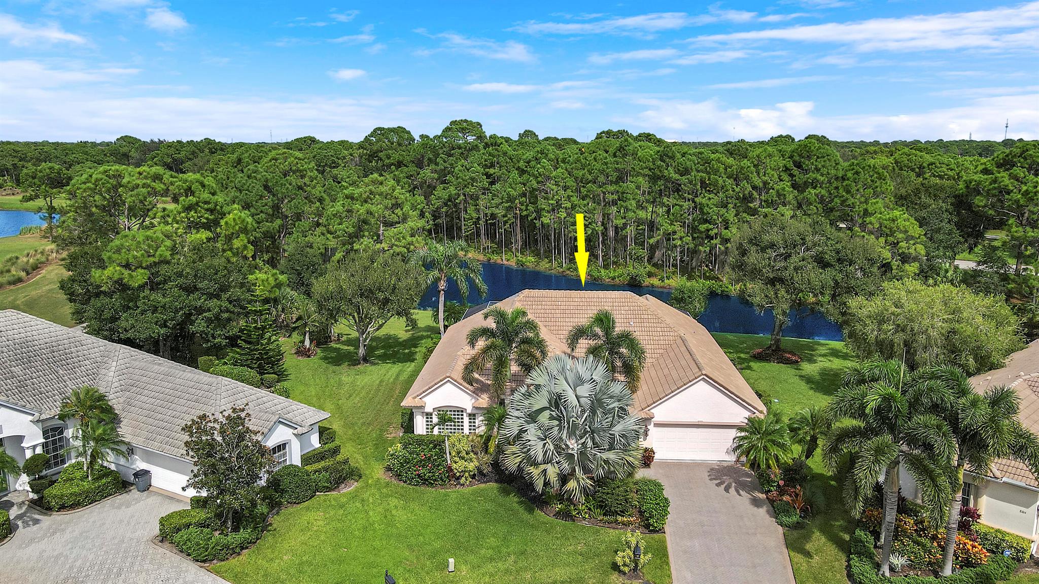RARE FIND IN PGA VILLAGE! Enjoy peaceful and private nature views from this pool & spa home nestled on a cul-de-sac in the heart of PGA Village! Located in the desirable Cypress Point subdivision, this 3BR/2BA/2CG home has a NEW ROOF IN 2022, sits on an oversized pie shaped lot and has a tranquil lake setting with no rear neighbors. Upon stepping through the front door, you will immediately be captivated by the back yard views and the oversized, screened pool area...a dream for entertaining and a peaceful place to enjoy the outdoors. Special features of the home include tile t/o the main living areas, a spacious master suite with large closets and oversized ensuite, split floor plan, charming breakfast nook, newer AC (2020), newer WH (2021), resurfaced pool (2022) and rescreened lanai.