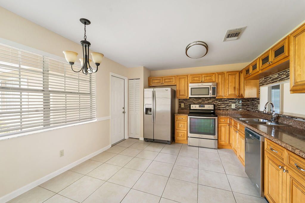 Photo of 189 Raintree Trail, Jupiter, FL 33458 (MLS # R10931338)