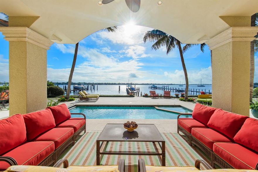 One of Palm City's Grandest Estates comes to market in one of the areas most Exclusive and Premier Waterfront Communities. Over 10,000 SF with no detail spared! Bring multiple vessels, including room for up to 60' boat, plus 27,000 pound lift, 2 jet ski lifts plus a floating dock. Exquisite master bedroom includes large sitting area, morning kitchen and His and Her closets PLUS a stunning dressing area. Spectacular dining room with custom built-in wine units (200 bottle capacity). Chef's gourmet kitchen with 2 Sub-Zero refrigerators, Viking cooktop, & double ovens. Elevator, Game Room, Exercise Room, Media Room, Custom Office and more! Impact windows and doors. Completely turn key. List of upgrades and options available. Truly a masterpiece to see.