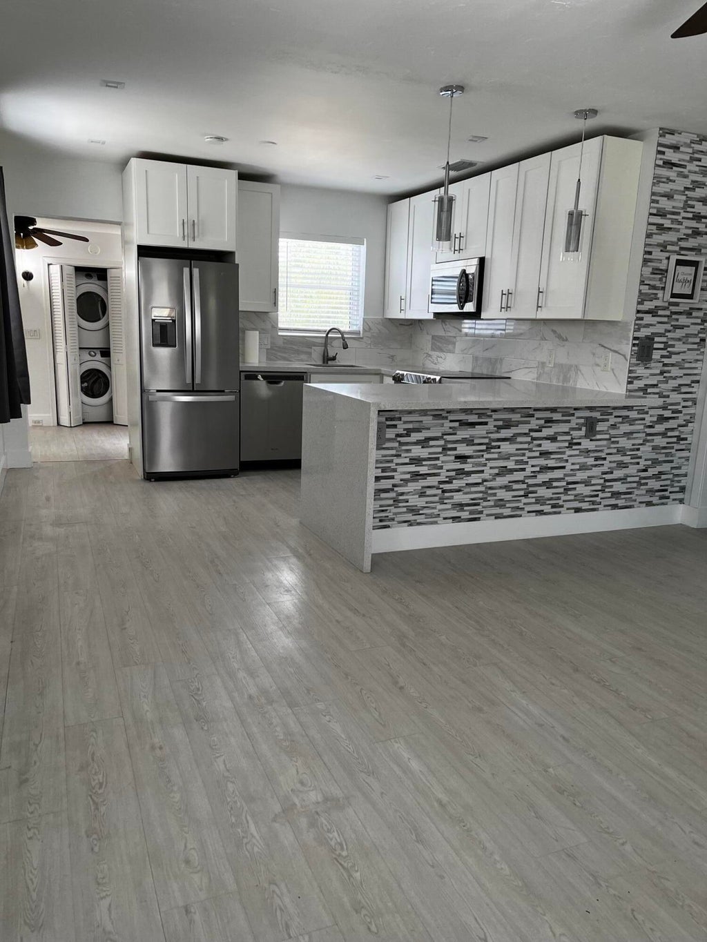 Photo of 135 SE 5th Avenue, Boynton Beach, FL 33435 (MLS # B26055444)
