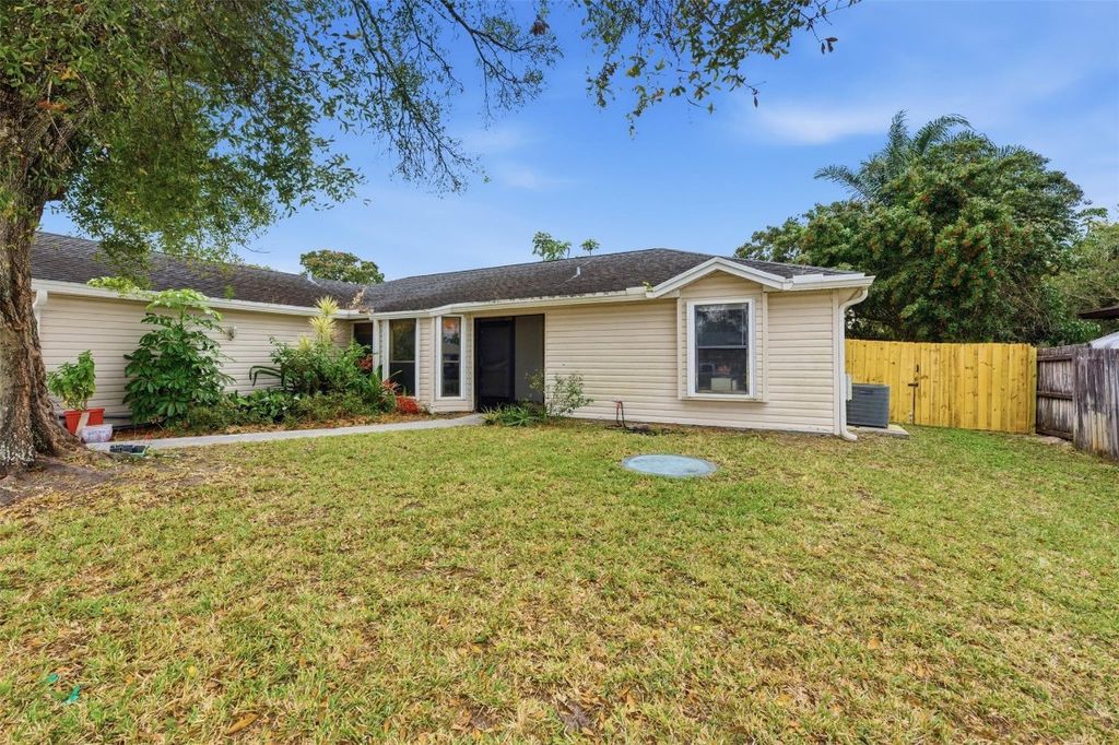Photo of 1258 SW Cynthia Street, Port Saint Lucie, FL 34983 (MLS # F10546403)