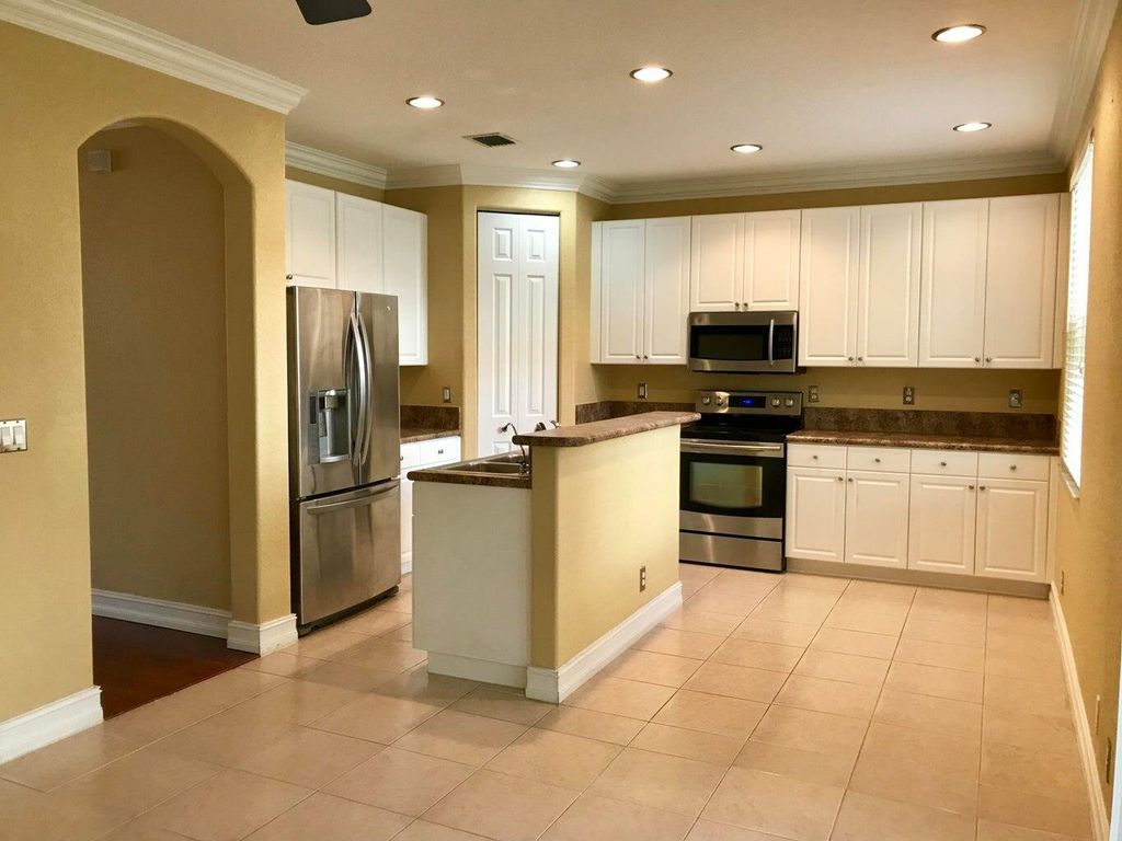 Photo of 4411 Regal Court, Delray Beach, FL 33445 (MLS # R10998573)