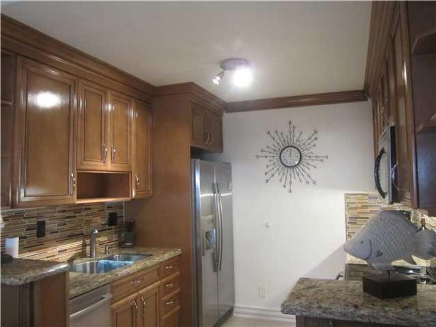 Absolutely stunning! This fully furnished and decorated 1 bedroom /1.5 bathrooms and small office features: upgraded kitchen and bathroom with granite counters and stainless steel appliances, wall unit in bedroom and crown molding, california walking cl oset, washer and dryer in unit etc. all you need to bring is your toothbrush!. Ready to move in. No Pets. Amenities are 2 pools and a gym. Located in the heart of Deerfield Beach. close to restaurants and shopping.