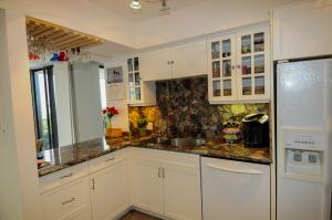 OLD PORT COVE COND THREE - Residential