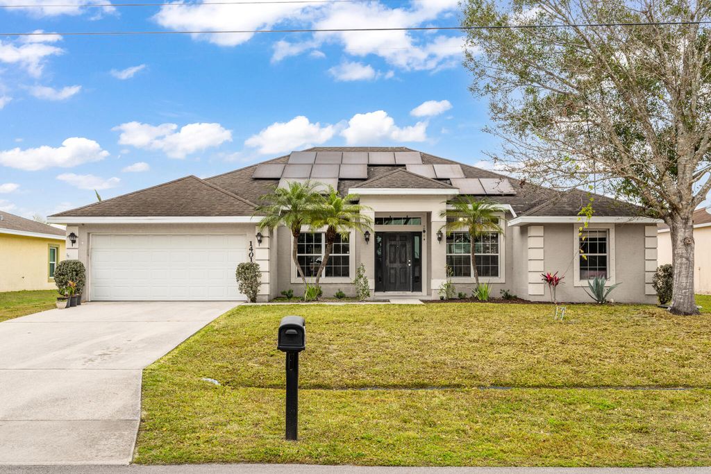 Photo of 1401 SW Bougainvillea Avenue, Port Saint Lucie, FL 34953 (MLS # R11160149)