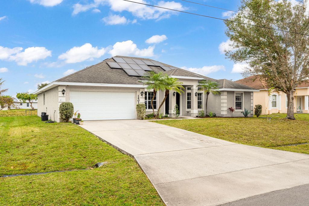 Photo of 1401 SW Bougainvillea Avenue, Port Saint Lucie, FL 34953 (MLS # R11160149)