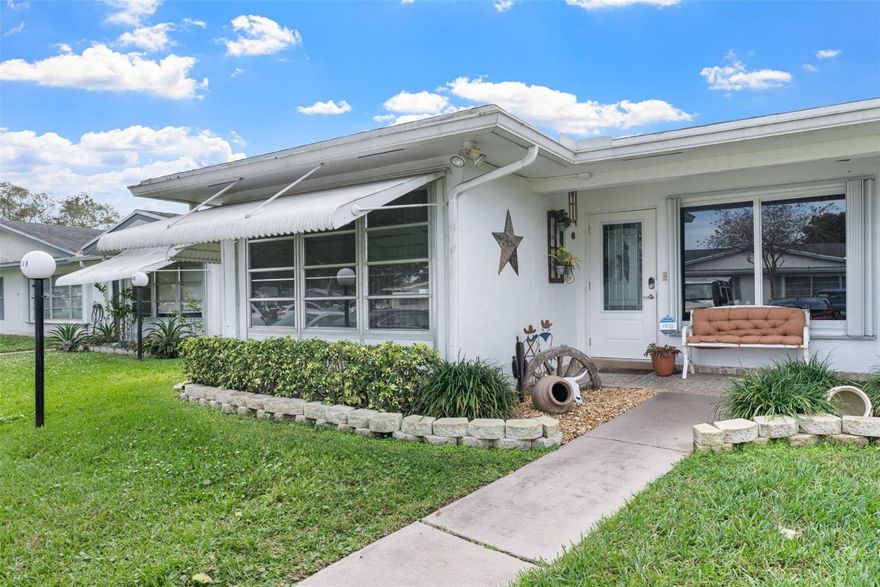 Lauderdale West 2/2 + bonus room, corner unit 4-plex, waterfront, 55+ community, gorgeous large patio overlooking beautiful backyard and waterway, Impact windows (partial), wood - look porcelain tile thru out, breathtaking kitchen and more. 2 parking spaces. This is not to be missed! Maintenance fee includes Fiber Optic HD TV & Internet, courtesy bus at your door, lawn service, repair/replace roof, exterior painting, clubhouse, 2 pools, Tennis courts, pool tables, Ping Pong, card rooms, professional shows, library, fitness center and much more. Close to shopping and restaurants. 20% down min, 700+ credit score please.