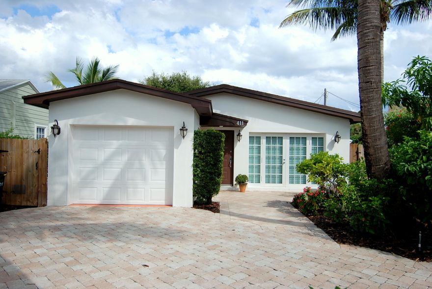 Beach cottage close to downtown Delray Beach, Intracoastal, and Beach.  Walk/bike to the beach and Atlantic Avenue.   One story, single family home with 3 bedrooms, 2 bathrooms, and a 1 car garage.  Nice paved circular driveway.  Mature landscaping.  Screened in patio in the back and property is fenced in.  Hurricane impact windows throughout, vaulted ceilings, retro bathrooms and kitchen.  Washer dryer in house.  All ages.