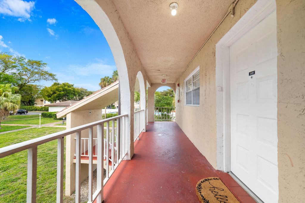 Photo of 2710 Riverside Drive #201a, Coral Springs, FL 33065 (MLS # B26022067)