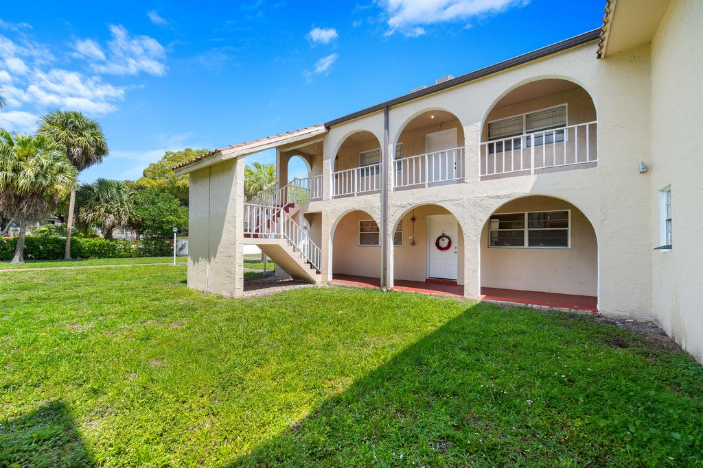 Photo of 2710 Riverside Drive #201a, Coral Springs, FL 33065 (MLS # B26022067)