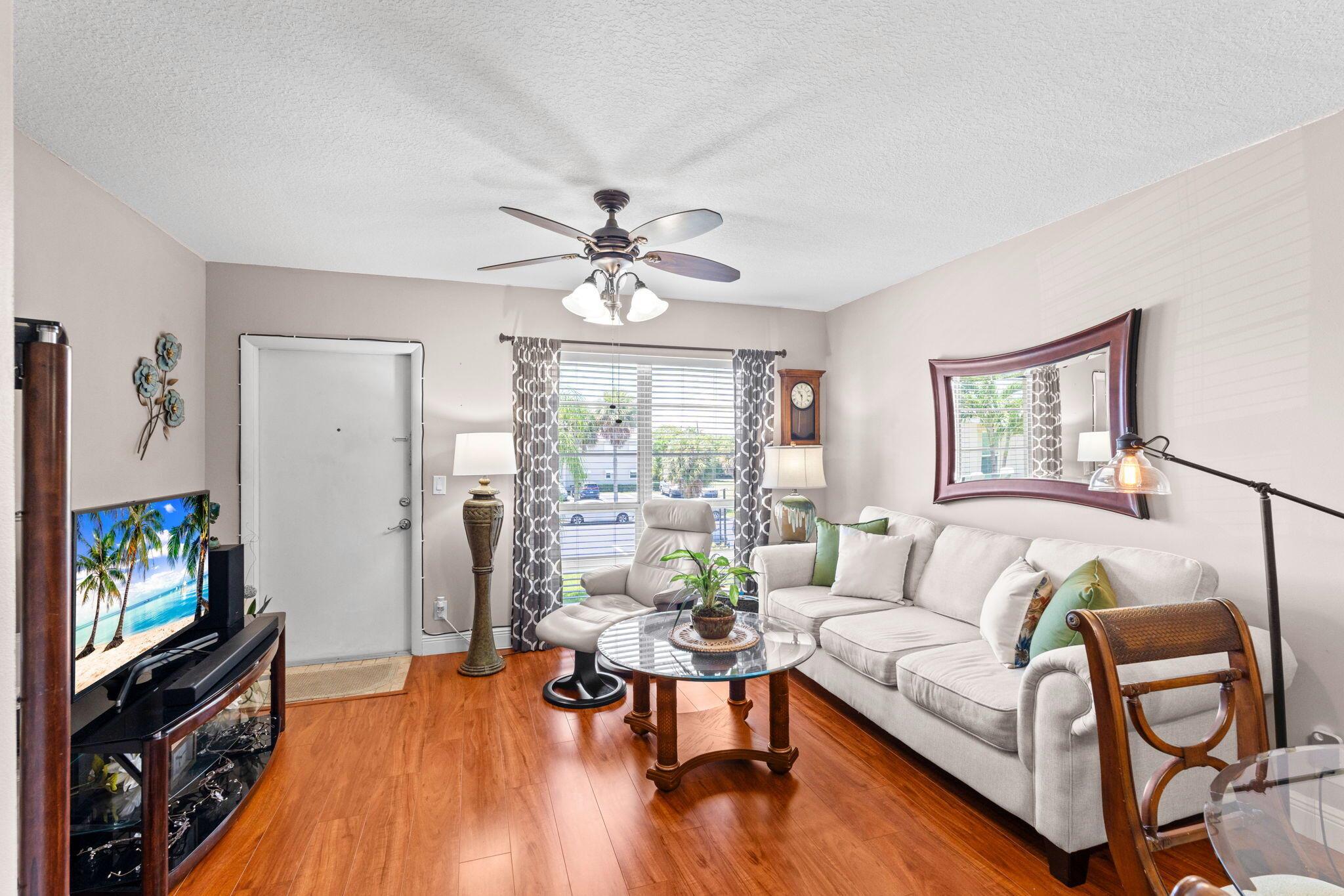 Cozy and bright 1bedroom,1.5 bathroom in a desirable 55+ community, located just under 10 minutes from the beach. This move in ready unit features Laminate wood flooring, an updated electrical panel and AC unit. New roof, updated appliances and a covered screened balcony with furniture included in the sale.Don't miss the opportunity to own this well maintained unit in a fantastic location close to shopping, dining and costal living.