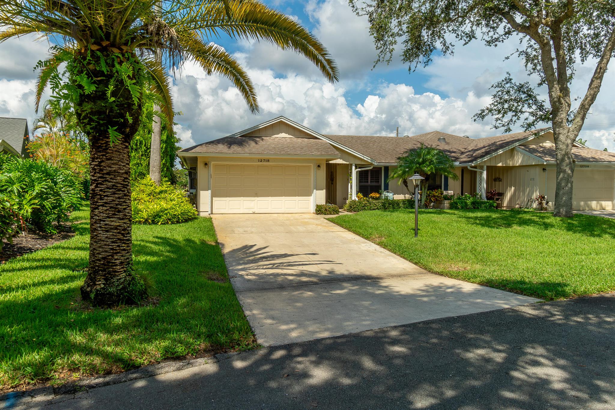 This charming two-bedroom, two-bath villa in the active Eaglewood golf community offers picturesque golf course views, a new A/C unit (2023), a 2019 roof, full furnishings, and a golf cart for easy access to amenities like tennis courts, bocce ball, a 18-hole golf course, a heated pool, a clubhouse, a workshop, and a dog park. The Hobe Sound beach is just a short drive away and plenty of fine dining in the area.
