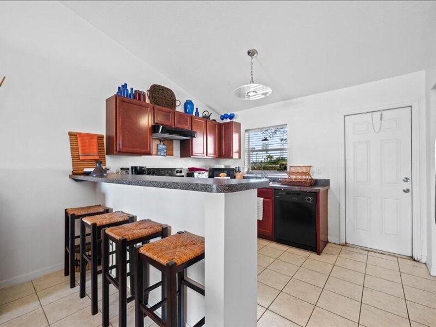 This well-located 3-bedroom, 2-bath home in Stuart features an open living area, updated kitchen, and a fully fenced backyard. Enjoy close proximity to downtown, beaches, shopping, and dining, making everyday living both convenient and enjoyable. Located in a convenient Stuart location near beaches, downtown, and local dining, this charming 3-bedroom, 2-bath home offers both comfort and functionality. The open floor plan creates an easy flow for everyday living, while the updated kitchen and fenced backyard provide space to gather and unwind. With close proximity to shopping, parks, and coastal attractions, this home is a great opportunity to enjoy the Treasure Coast lifestyle.