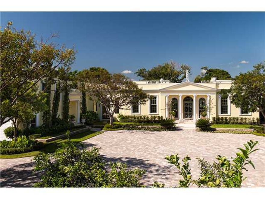 Stunning Lakefront Home! Clarence Mack’s former residence. Elegant 6 bedroom estate in perfect condition is now available. Totally restored, it boasts 118 +/- feet on the Intracoastal with exquisite views and a dock. Open and light from the moment you enter from the enormous entry courtyard, this one of a kind lives likes a compound with attached bedroom wings. The scale and details are superlative along with a 70’ infinity pool and new Cabana with full kitchen and bathroom to entertain friends. The expansive master suite is on the main level and includes two luxury baths, sitting room and office. Impact windows/doors, new roof, and stunning landscaping enhance this beautifully designed Regency, located on Billionaires’ Row, close to the airport, shopping and the beach!