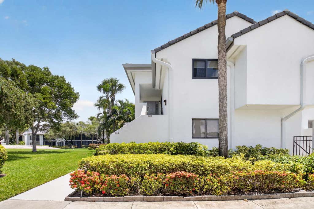 Photo of 7665 Glendevon Lane, Delray Beach, FL 33446 (MLS # B26051525)