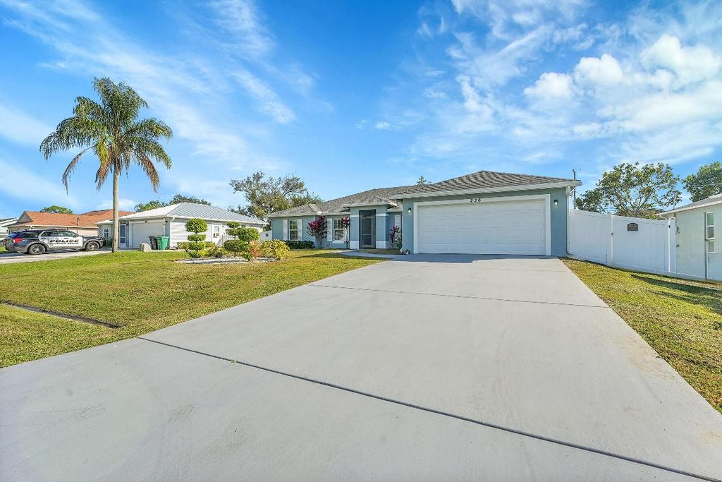 Photo of 226 SW Starfish Avenue, Port Saint Lucie, FL 34984 (MLS # R11148275)