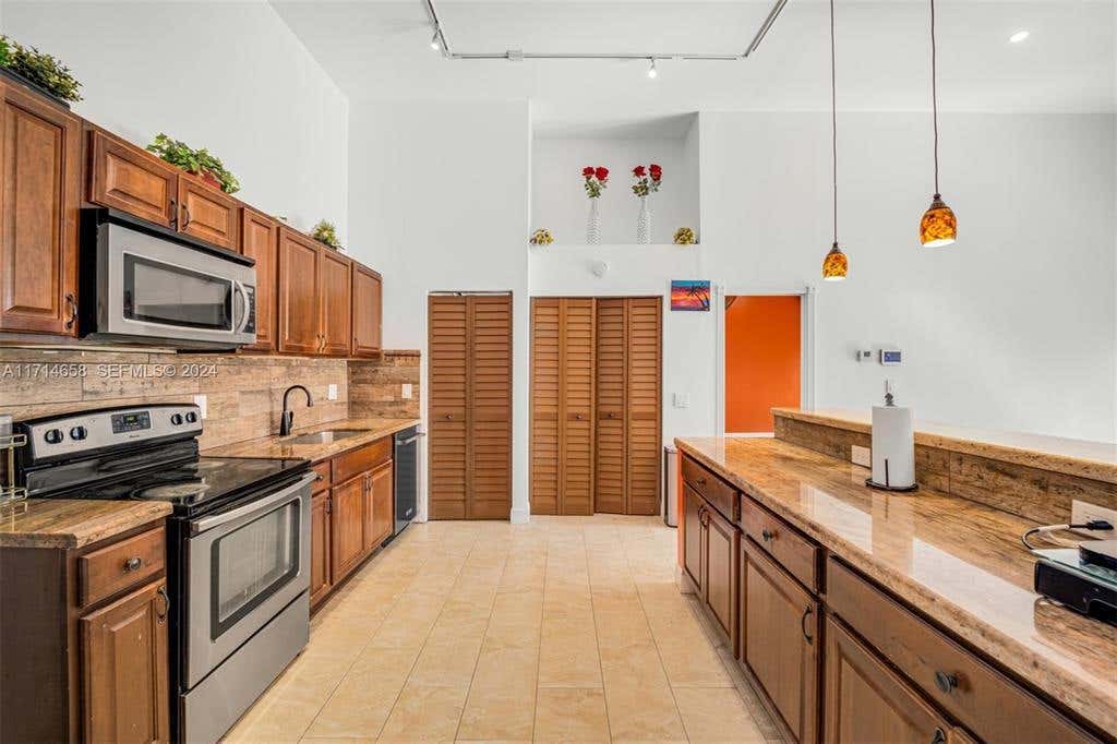 Photo of 401 Leslie Drive, Hallandale Beach, FL 33009 (MLS # B26068872)