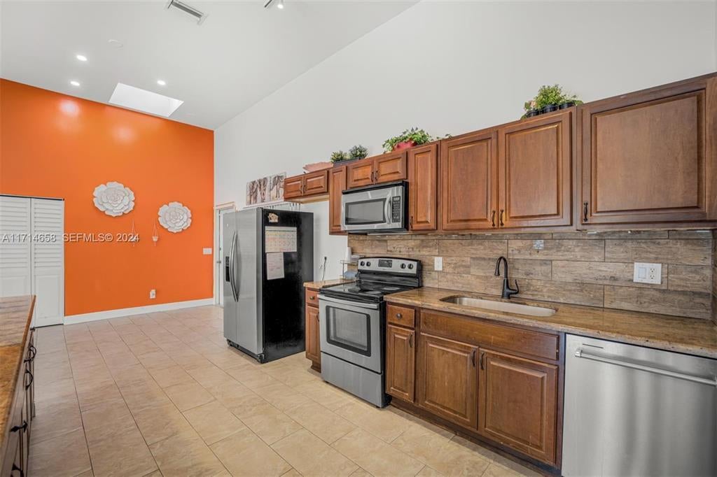 Photo of 401 Leslie Drive, Hallandale Beach, FL 33009 (MLS # B26068872)