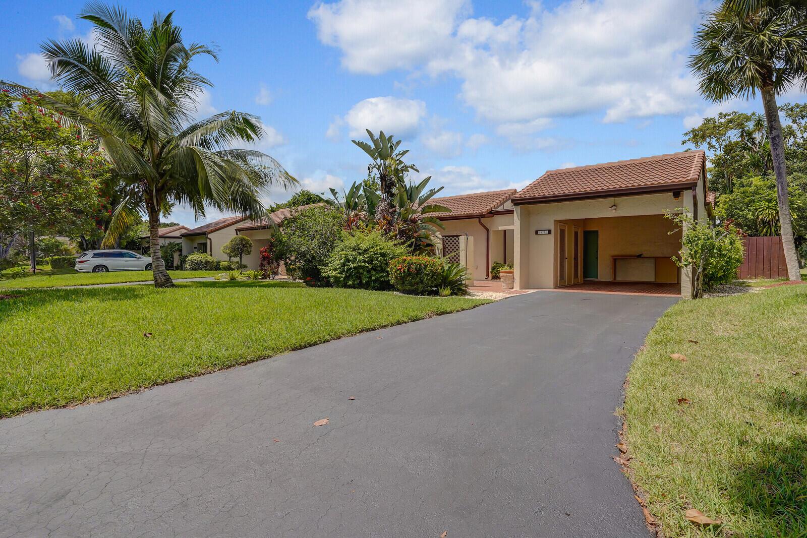 Enjoy magnificent golf course and lake views from this bright and spacious 3BR/2BA corner villa in Boca Lago. The third bedroom is currently designed as a den, adding versatility to the open layout. Soaring volume ceilings and an oversized Florida room create a light-filled living space overlooking breathtaking fairway vistas. The primary suite features two large walk-in closets and a primary bath with both a Roman tub and separate shower. Additional highlights include a private open patio ideal for BBQs or a fresh herb garden, abundant storage, and a dedicated laundry room.Located in Horizons of Boca Lago--the only Boca Lago community without age restrictions--this home is zoned for A+ schools, making it a perfect choice for families. Come check it out today!