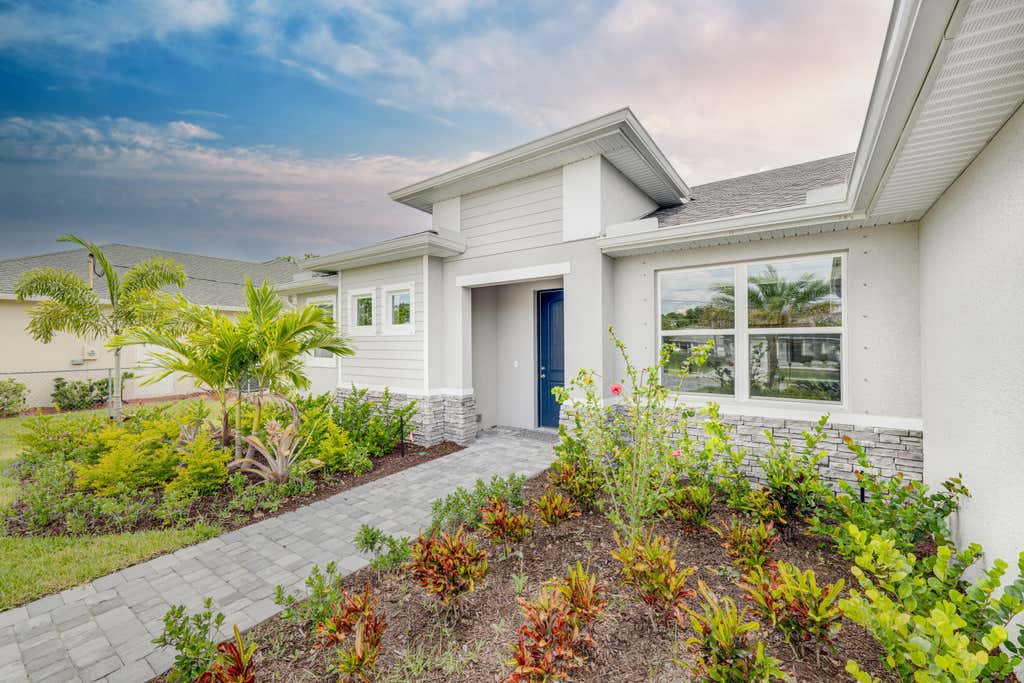 Photo of 1102 SW Hunnicut Avenue, Port Saint Lucie, FL 34953 (MLS # R10985795)
