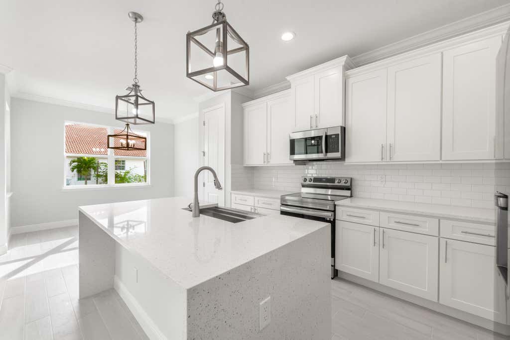 Photo of 1102 SW Hunnicut Avenue, Port Saint Lucie, FL 34953 (MLS # R10985795)