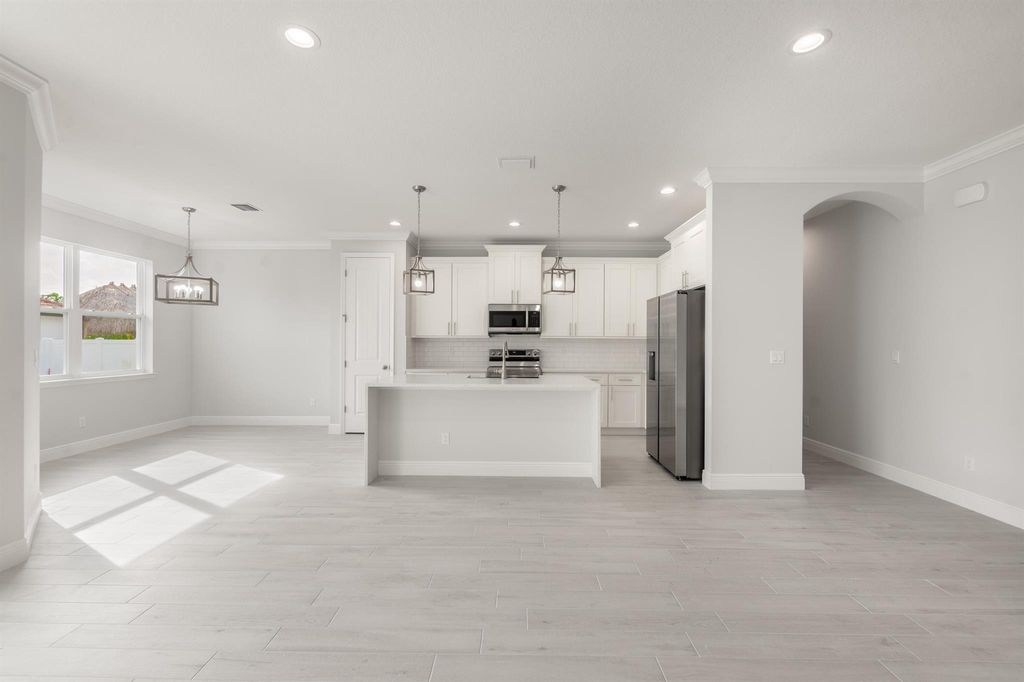 Photo of 1102 SW Hunnicut Avenue, Port Saint Lucie, FL 34953 (MLS # R10985795)