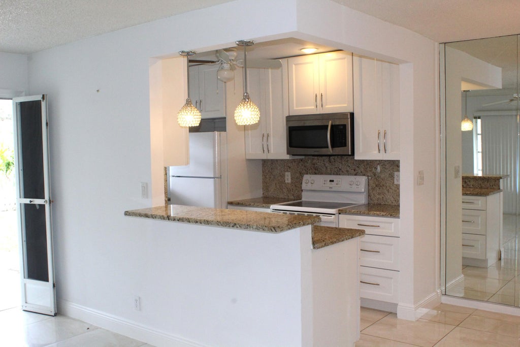 Photo of 725 High Point Boulevard N #D, Delray Beach, FL 33445 (MLS # R11061775)