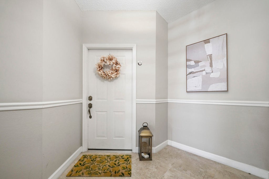 Photo of 5780 Coach House Circle #C, Boca Raton, FL 33486 (MLS # B26072700)
