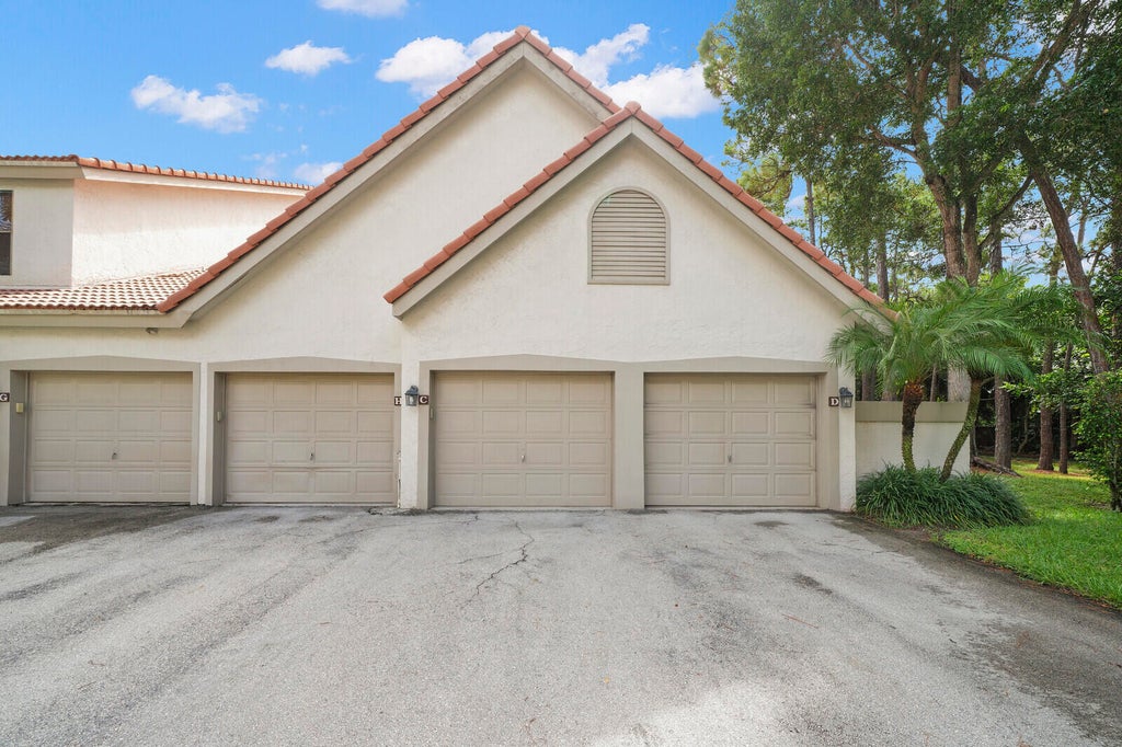Photo of 5780 Coach House Circle #C, Boca Raton, FL 33486 (MLS # B26072700)