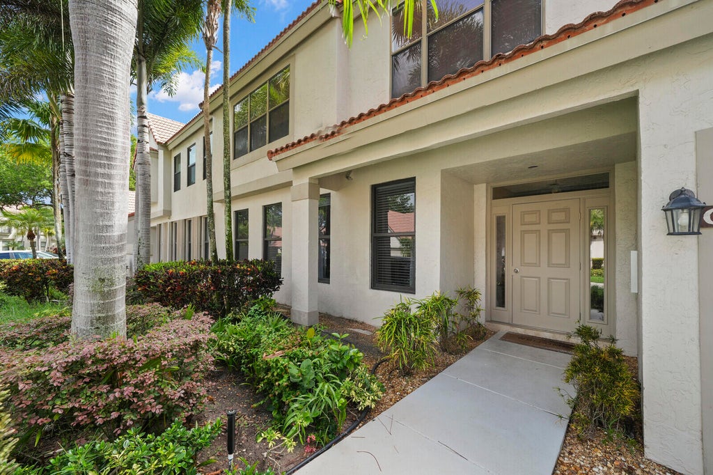 Photo of 5780 Coach House Circle #C, Boca Raton, FL 33486 (MLS # B26072700)