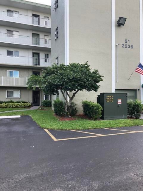 Photo of 2236 N CYPRESS BEND Drive #106, Pompano Beach, FL 33069 (MLS # B26066536)