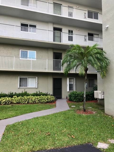 Photo of 2236 N CYPRESS BEND Drive #106, Pompano Beach, FL 33069 (MLS # B26066536)