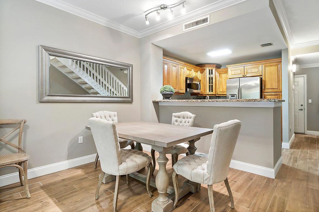 Photo of 11765 Saint Andrews Place #105, Wellington, FL 33414 (MLS # R11077314)