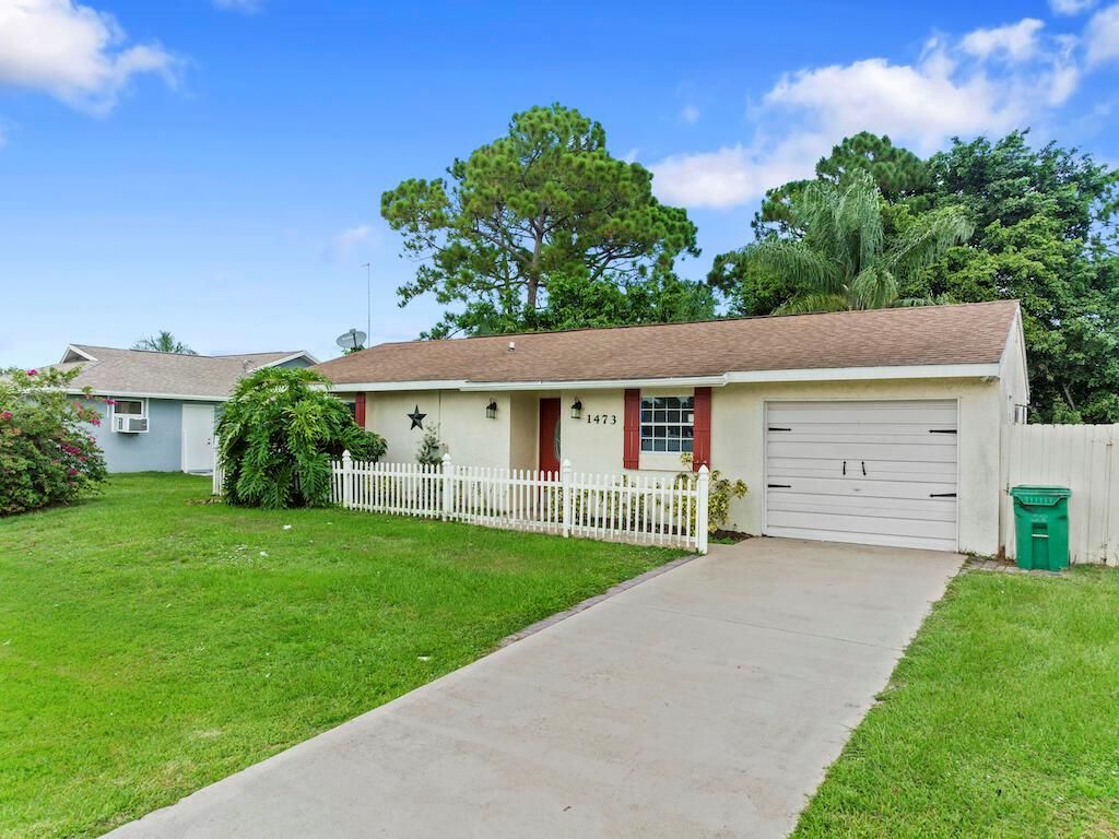 Photo of 1473 SE Ocean Lane, Port Saint Lucie, FL 34983 (MLS # R10822311)