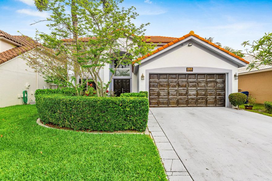 RARE OPPORTUNITY IN STONEBRIAR WITH 5 BEDROOMS, 3.5 BATHS!   Thoughtfully upgraded and move-in ready, this home features a Spanish tile roof (2019), screened patio (2020), and beautiful wood flooring upstairs (2022). The fully refreshed kitchen shines with updated counters, modern lighting, and refinished cabinets (2025) Enjoy peace of mind with hurricane impact windows (2025), newer water heater (2024), and fresh interior and exterior paint (2024).   Located in a desirable community featuring a pool and tennis courts, this home checks every box for stylish, low-maintenance South Florida living! It is is perfectly situated just minutes from both I95 and Turnpike, top shops, grocery stores, and popular restaurants.