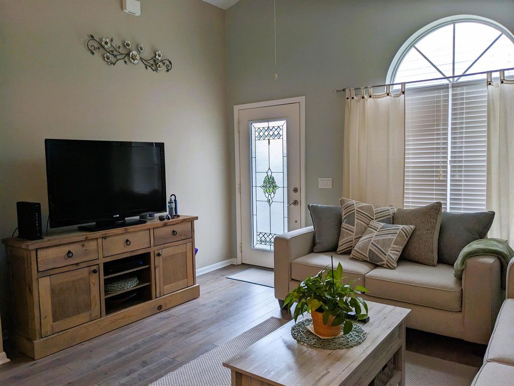 Photo of 1200 NW Lombardy Drive, Port Saint Lucie, FL 34986 (MLS # R10966621)