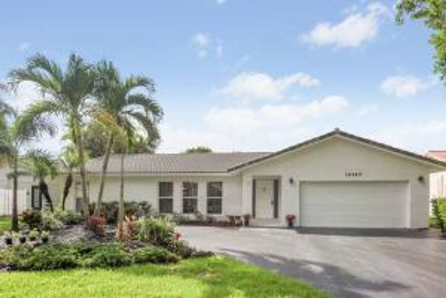 BEAUTIFUL MOVE IN READY,SEMI CIRCULAR DRIVE, GORGEOUS NEW FLOORS 21 x 21 ON THE DIAGNOL THROUGHOUT,ORIGINALLY A 4/2 OPENED TO A 3/2, JUST PAINTED, WATER HEATER 1/15, A/C UNIT AND HANDLER,8/12, KITCHEN FAUCET AND GARBAGE DISPOSAL 4/14, NEW SPRINKLERS/TIMER 8/15, POOL PUMP 10/12, WASHER/DRYER 7/14,  STAINLESS STEEL APPLIANCES,GRANITE  KITCHEN COUNTERS, ALL ENHANCED BY PRIVATE POOL UNDER SCREENING WITH CHILD SAFETY GATE. NEWLY LANDSCAPED WITH NEW SOD FRONT AND BACK, GARAGE FLOOR PAINTED.  INCLUDES ALL FIXTURES AND WINDOW TREATMENTS.  PRICED TO SELL.