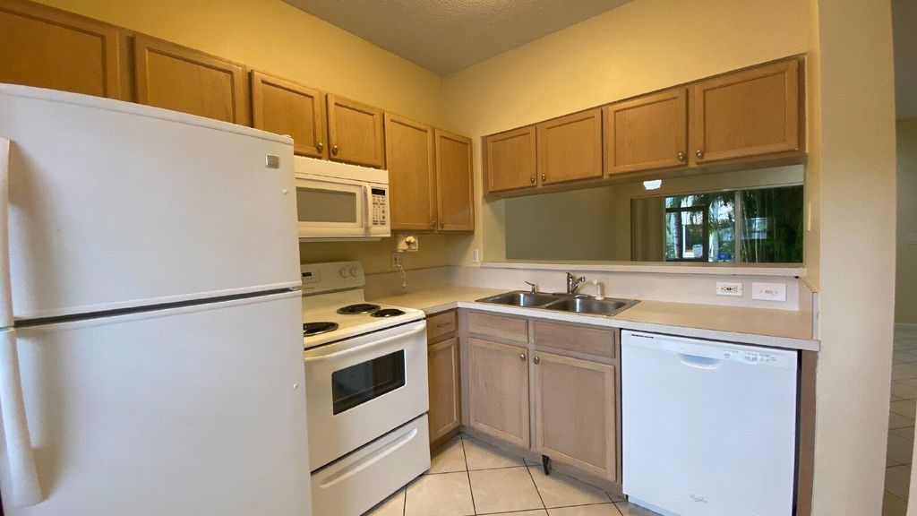 Photo of 6967 Blacksmith Way, Lake Worth, FL 33467 (MLS # R11115134)