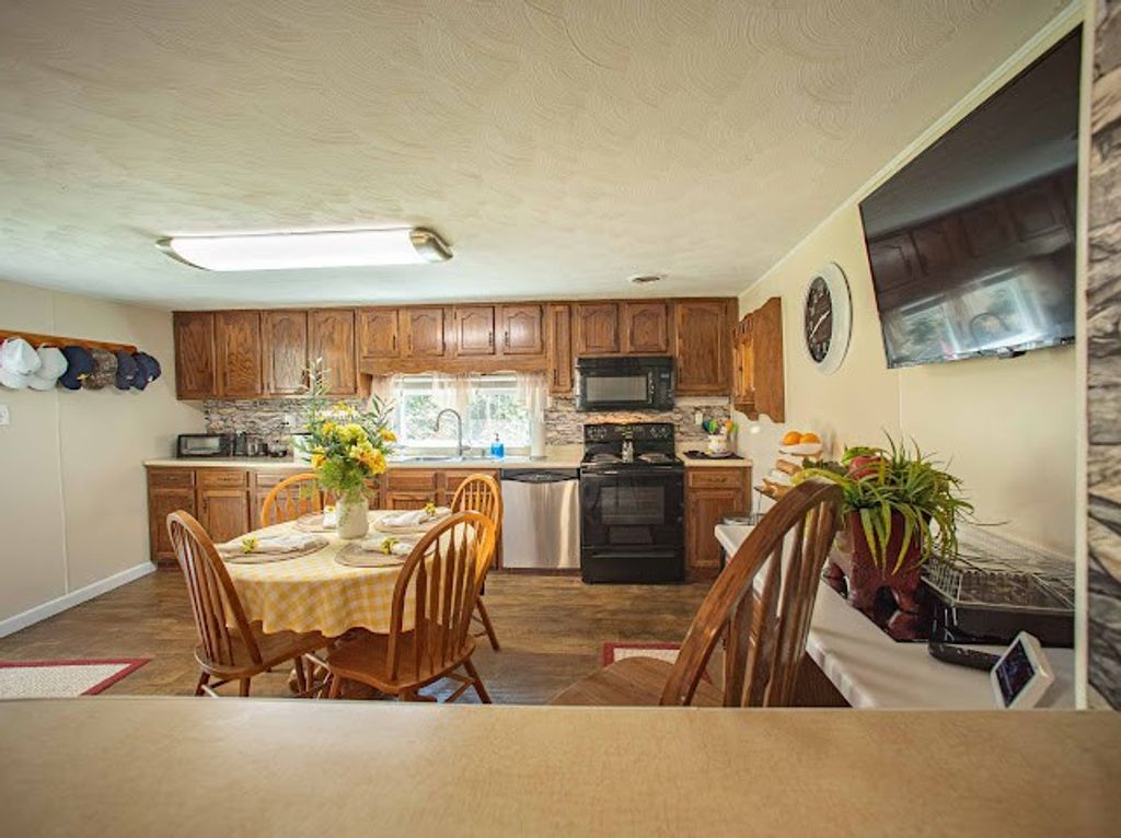 Photo of 11432 Slate Creek Road, Grundy, VA 24614 (MLS # 109543)