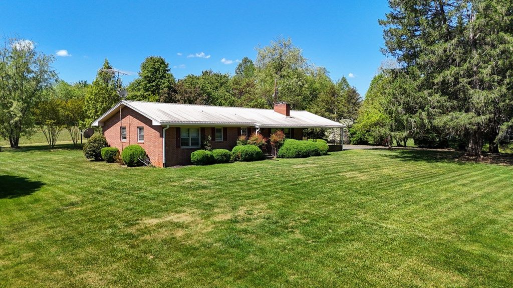 Photo of 11830 Ararat Hwy, Claudville, VA 24076 (MLS # 109655)