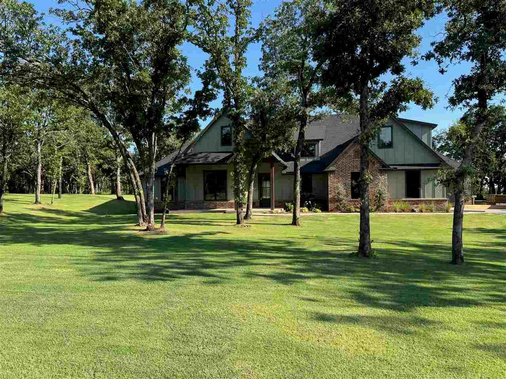 Photo of 21188 Reserve Cir, Harrah, OK 73045 (MLS # 134737)