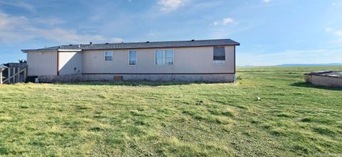 Photo of 123 Wind In Wire Ranch Road, Laramie, WY 82072 (MLS # 250219)