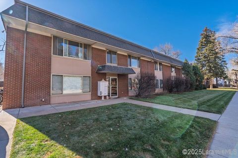 Photo of 1516 Grand Ave #203, Laramie, WY 82070 (MLS # 250754)