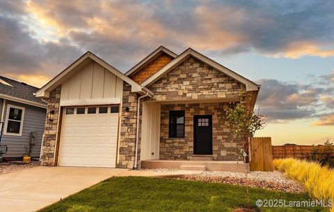 Photo of 3911 Buckskin Trail, Laramie, WY 82072 (MLS # 250377)