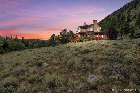 Photo of 23 Broken Bridge Rd, Centennial, WY 82055 (MLS # 250547)
