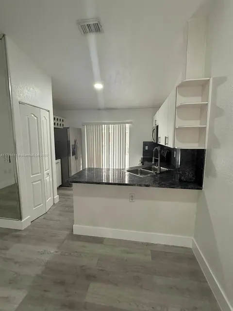 11053 W Okeechobee Rd Unit 201, Hialeah Gardens, FL MLS: A11785511