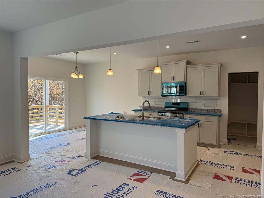 Photo of 176 Travelers Way, Lillington, NC 27546 (MLS # LP753052)