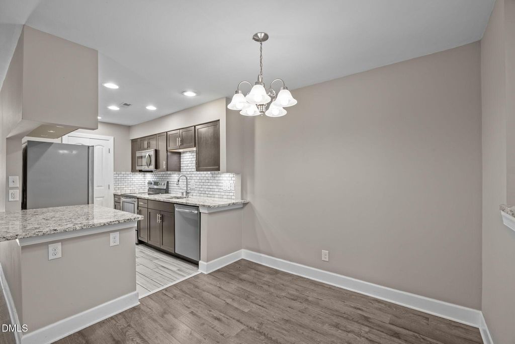 Photo of 1130 Schaub Drive #J, Raleigh, NC 27606 (MLS # 10132166)