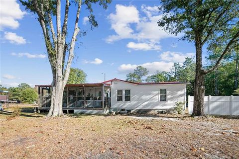 Photo of 5345 Chicken Foot Road, Saint Pauls, NC 28384 (MLS # LP760363)